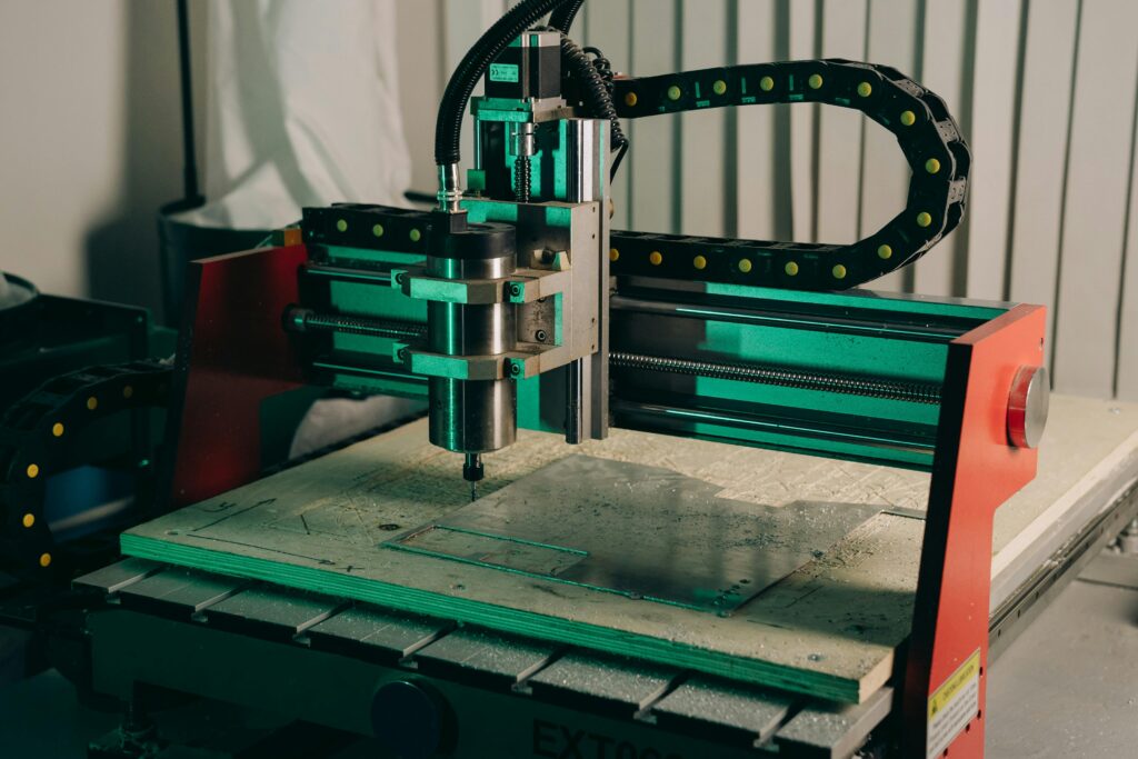 pexels-photo-9242913-9242913-2 Close-up of a CNC machine in action in an industrial setting.